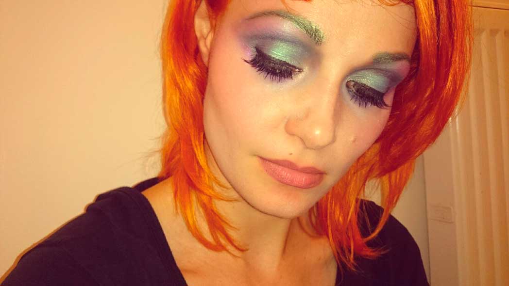 medium length ginger hair grean violet creative makeup on Yana Kozyr top model